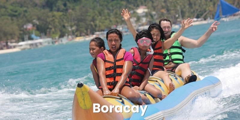 Family In Boracay On A Boat In the Water